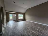 Another View of the very Large Living Room with Double Windows for Natural Light.  Picture of Previous House.