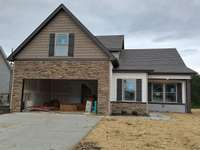 Lot 113 Valley Farms has a 2 Car Attached Garage and is Ready to be Your New Home!