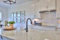 This photo is a sample of the Colburn floorplan.  Options and exterior will vary depending on customer selections and preferences.
