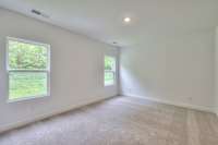 This photo is an example of the Sutherland floorplan. Selections and finishes may vary.
