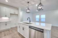 This photo is an example of the Sutherland floorplan. Selections and finishes may vary.