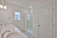 This photo is an example of the Sutherland floorplan. Selections and finishes may vary.