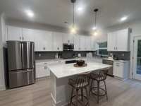 The open concept kitchen is a show stopper