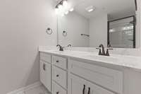 The master bathroom has a huge shower, and a large counter top with double vanities. Another feature found in much more expensive homes.