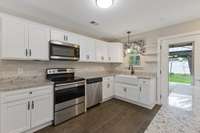 There is a farm sink and faucet that the seller had custom installed in her kitchen. Much nicer working in a kitchen with a farm sink.