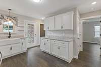 Plenty of cabinet space, and counter space.