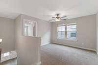 Here is another shot of the bonus area above the second floor. Some of the other pictures call it a loft. But as you can see, it is an actual living area that the seller has used as her office.