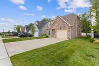 It features a nicely manicured yard, that is fully maintained by the HOA. So you don't have to cut the grass.