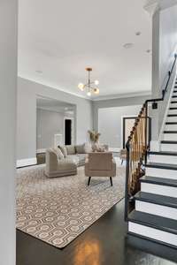 generous scale and seamless flow, highlighting refined finishes and inviting spaces ideal for both intimate gatherings and grand entertaining.