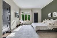 Flooded with natural light, the master bedroom boasts a serene sanctuary where indoor elegance meets outdoor beauty.