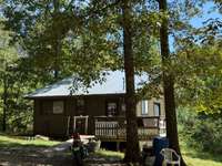 Fresh paint has been added and a new deck is in process!