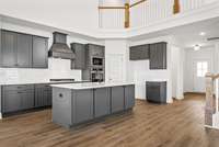 Gourmet kitchen with gas cooktop.