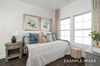 Bedroom 3, located on the main floor makes for a great guest space or could be utilized as your home office.