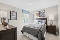 Bedroom #3 with a walk-in closet.