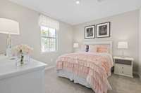 Bedroom #2 with a walk-in closet.