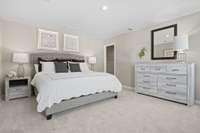The spacious owner's bedroom boasts a large walk-in closet and an en-suite.