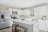 The kitchen features a nice size island and all appliances are included!