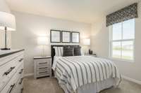 Bedroom #3 with a walk-in closet.