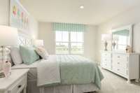 Bedroom #2 with a walk-in closet.