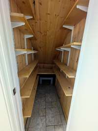 Pantry or extra storage under the stairs...