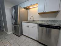 Granite countertops and tile flooring...