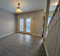 Dining area from the kitchen, looking onto the private patio...