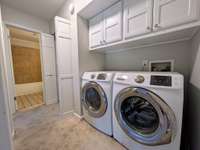 Samsung washer and dryer remain with the unit, upper cabinet storage...