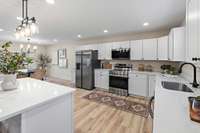 The new counters are a stunning white quartz.