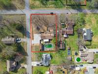 Enjoy the increased privacy of a corner lot! Mature trees provide shade in the summer.