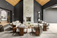 Cozy up outdoors with a beautiful covered patio featuring a built-in fireplace—your new favorite spot for relaxing or entertaining, rain or shine.