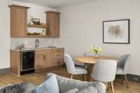 Stylish wet bar with beverage fridge and built-in storage—an ideal setup for effortless entertaining and everyday convenience.