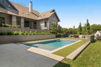 Close-up of the sparkling pool, showcasing its inviting design and tranquil vibes—your perfect escape just steps from home.