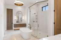 Spa-like bath includes oversized double wardrobe closets and spa like bath with double vanities, 
soaking tub and oversized separate showe