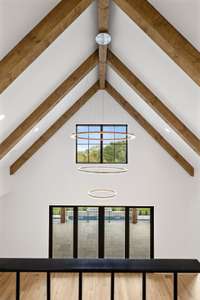 Experience the. grandeur of this offering a stunning view overlooking the fabulous living areas.