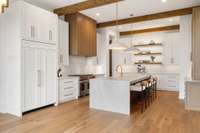 Dual access prep kitchen compliments the stunning state-of-the-art primary kitchen.