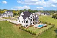 Welcome to your dream oasis! This beautiful home boasts a sparkling pool and spa, a sprawling backyard, and finished basement,