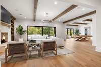 The finished basement features an impressive rec room with a fireplace, custom built-in cabinetry,  game room offering plenty of room for entertainment and relaxation , and unforgettable memories with the family and friends.