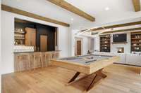 Elevate your entertaining experience with a full bar and a climate-controlled wine cellar.