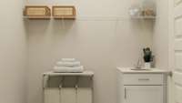 Extra large laundry room with laundry sink. These are artist's renderings of staged rooms, not actual home listed, but our home will be completed soon.
