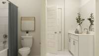 Third full bathroom on main level. These are artist's renderings of staged rooms, not actual home listed, but our home will be completed soon.