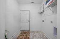 Laundry/mud room coming in from the garage.