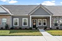 Maintenance free living at it's finest! Quiet neighborhood! Cozy home!