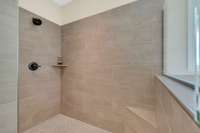 Oversized walk-in shower...no curtain or glass shower doors even needed!!