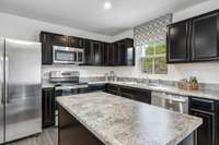 The kitchen comes with an optional island, a pantry, and all appliances are INCLUDED!