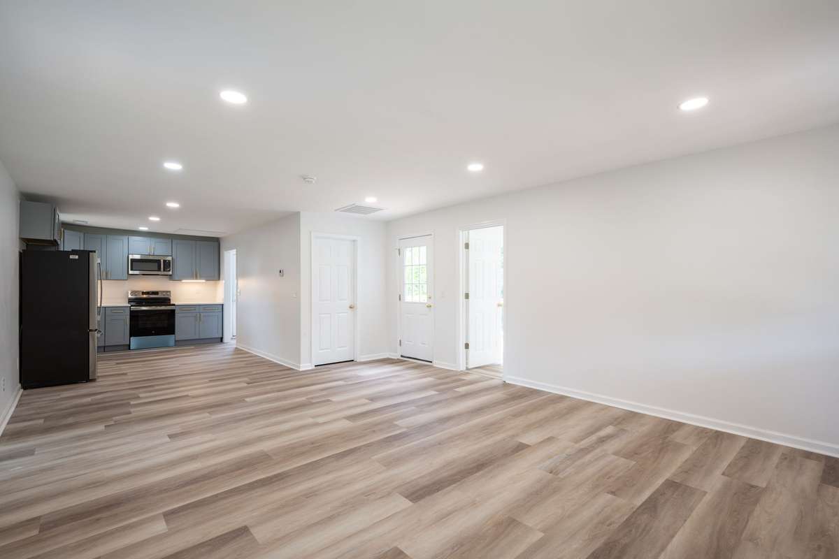New cabinets, quartz counter tops, GE Stainless Steel Refrigerator, Range, Dishwasher, and Microwave.  New LVP flooring, paint, and fixtures!