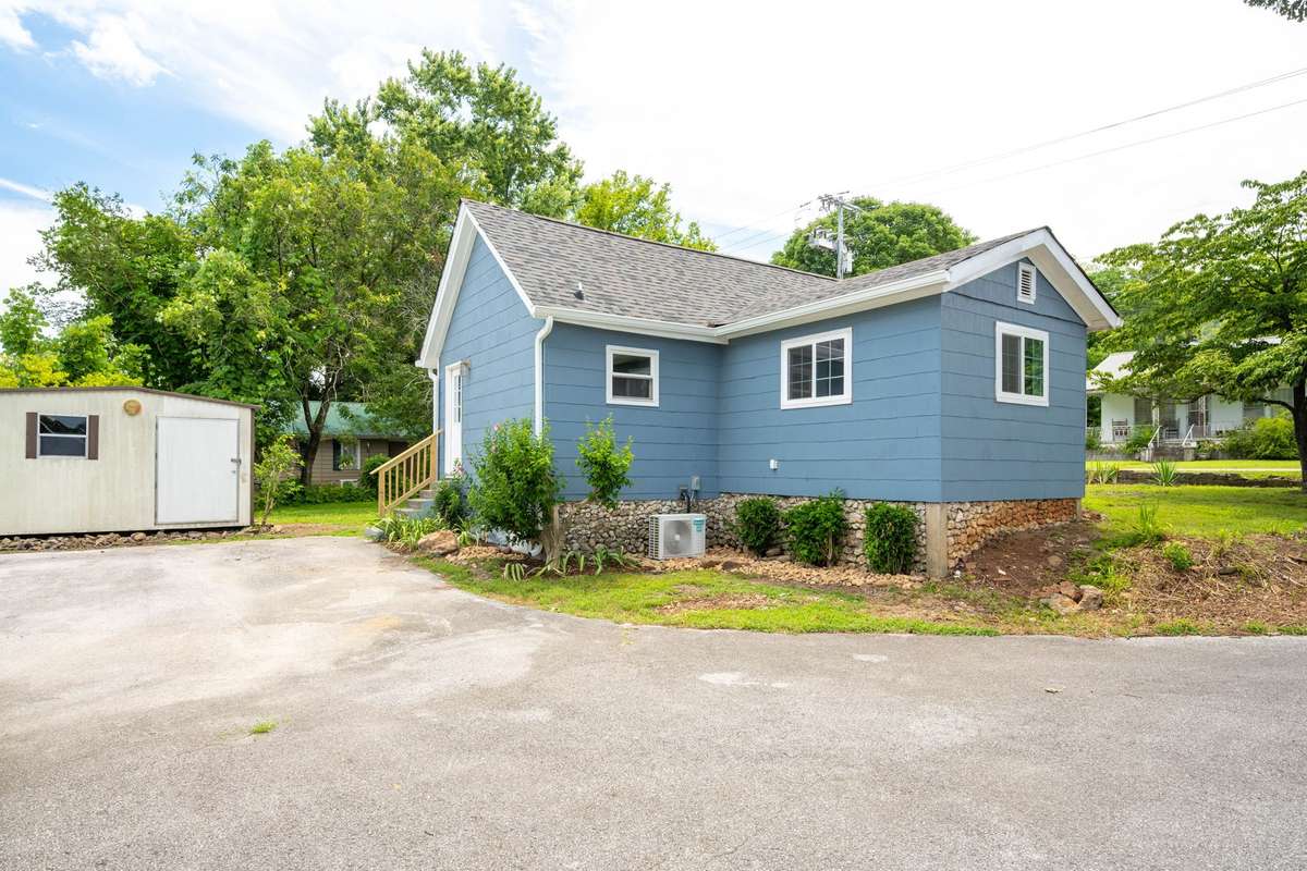 Ample parking on the concrete driveway.  New roof and exterior paint.  The shed conveys with the property!