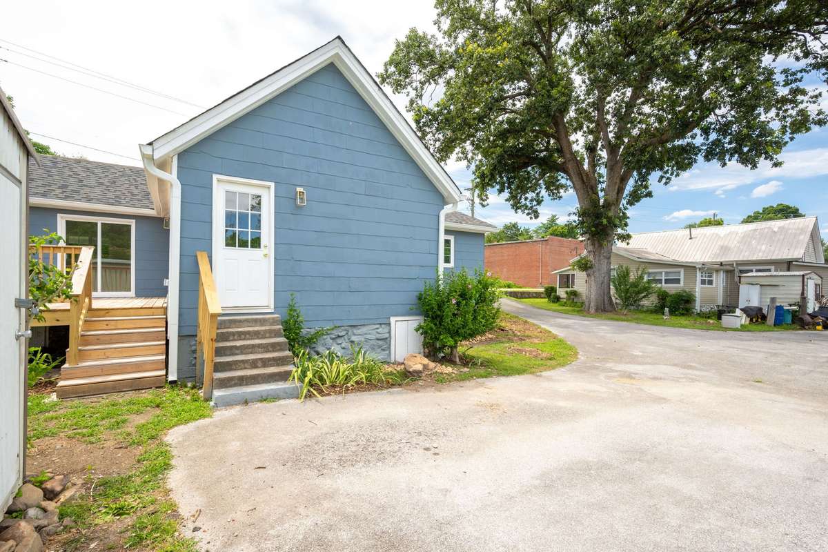 Ample parking on the concrete driveway, New wood deck, new roof and exterior paint.