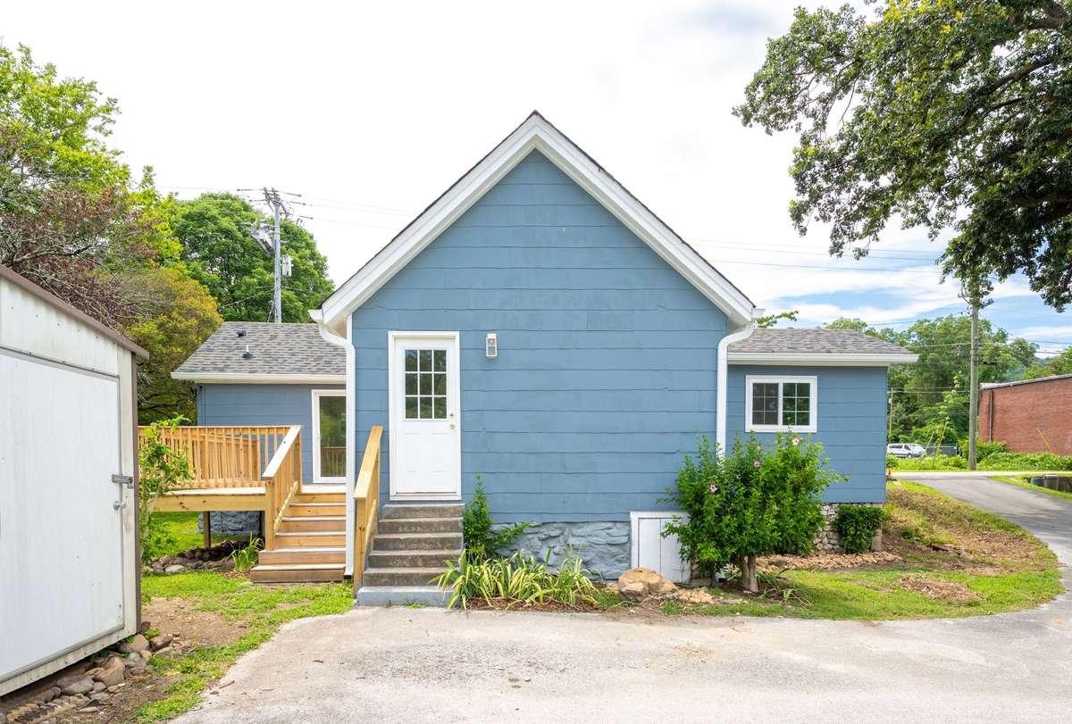 Ample parking on the concrete driveway, New wood deck, new roof and exterior paint.  The shed conveys with the property!