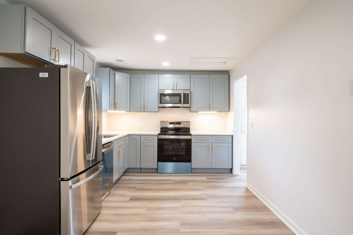 New cabinets, quartz counter tops, GE Stainless Steel Refrigerator, Range, Dishwasher, and Microwave.  New LVP flooring, paint, and fixtures!