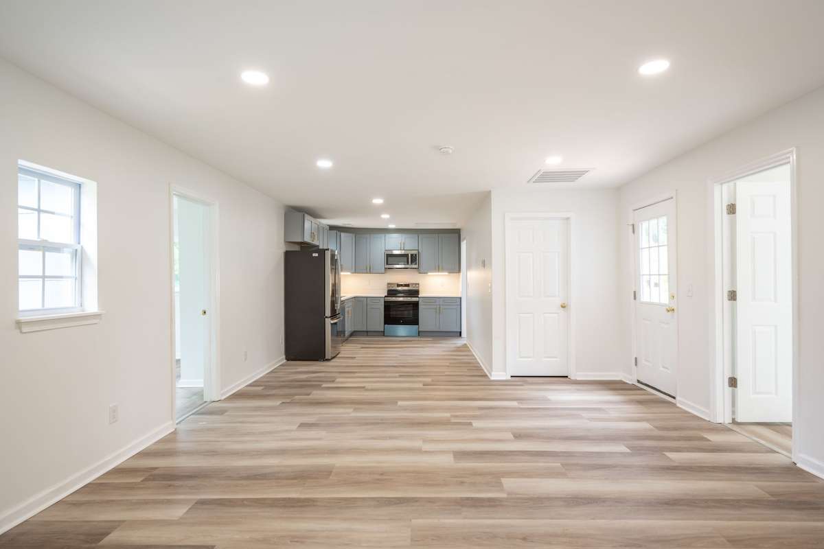 New cabinets, quartz counter tops, GE Stainless Steel Refrigerator, Range, Dishwasher, and Microwave.  New LVP flooring, paint, and fixtures!